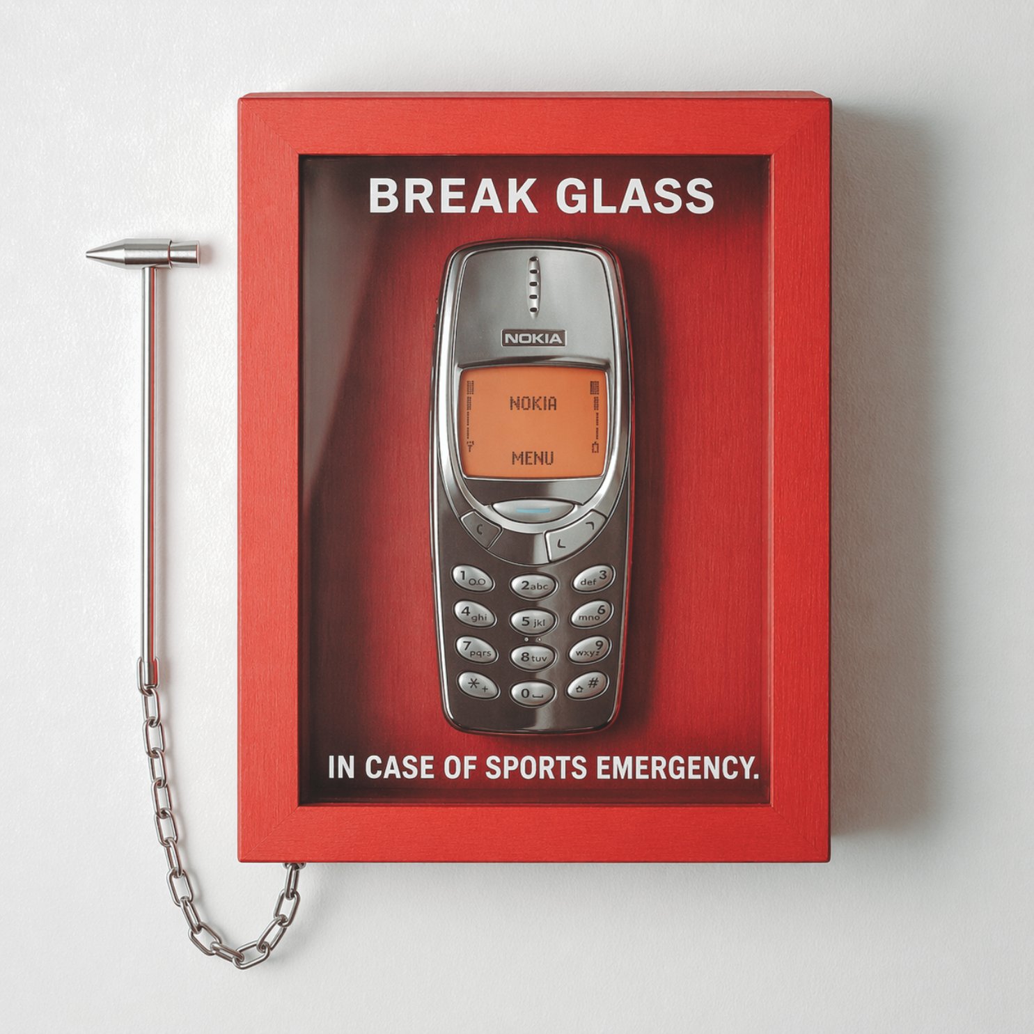 Break Glass In Case of Sports Emergency — vintage Nokia in a red box